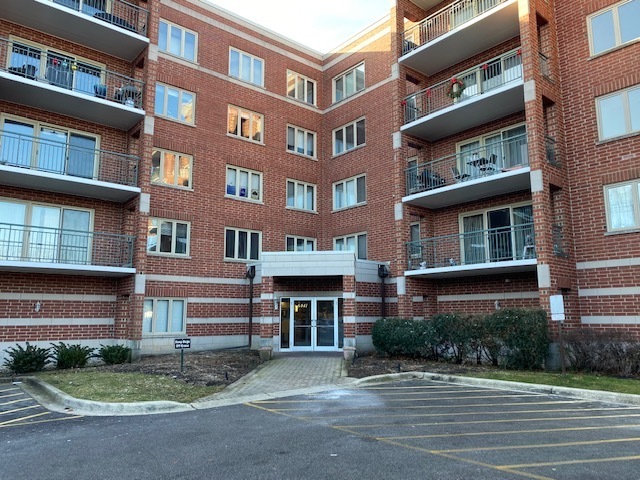 Property Photo: 6441 W Warner Avenue 215 IL 60634