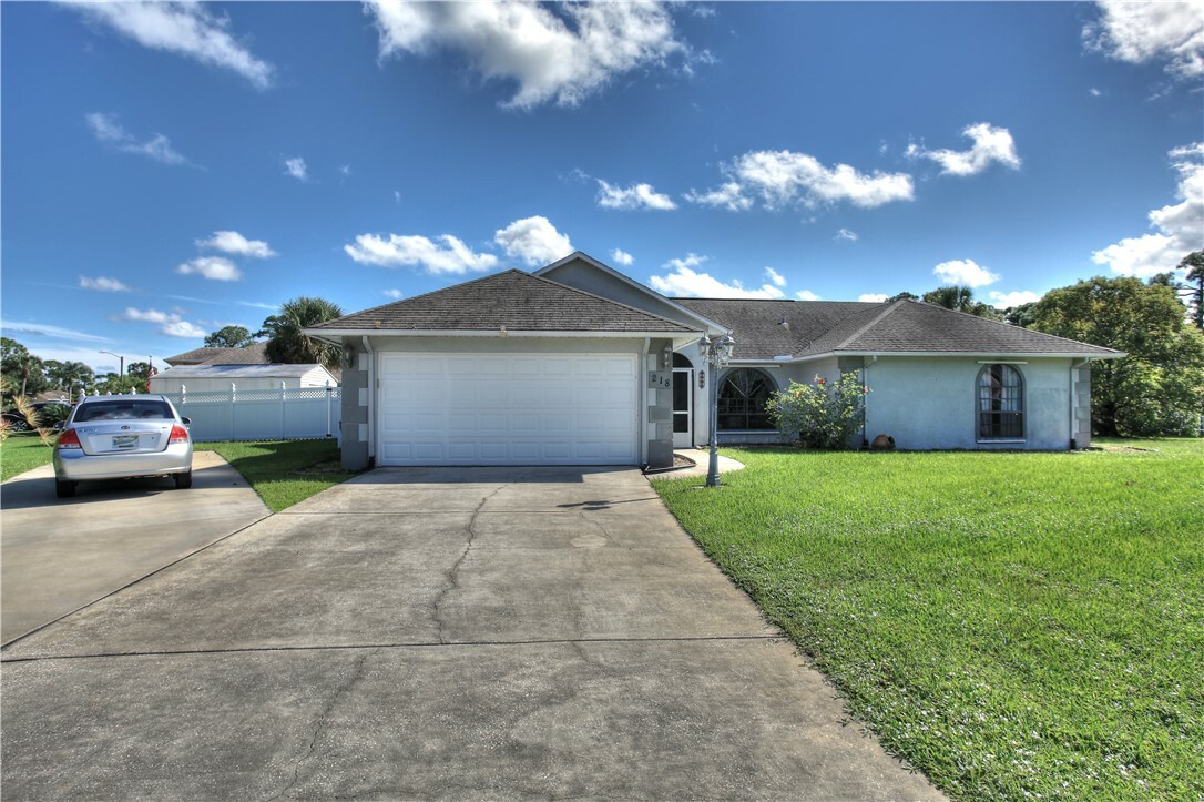 Property Photo:  218 Periwinkle Drive  FL 32958 