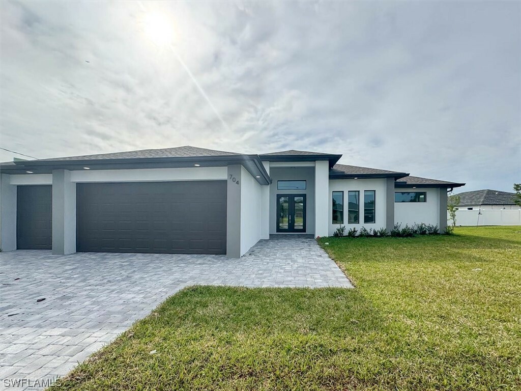 Property Photo:  704 SW 26th Street  FL 33914 