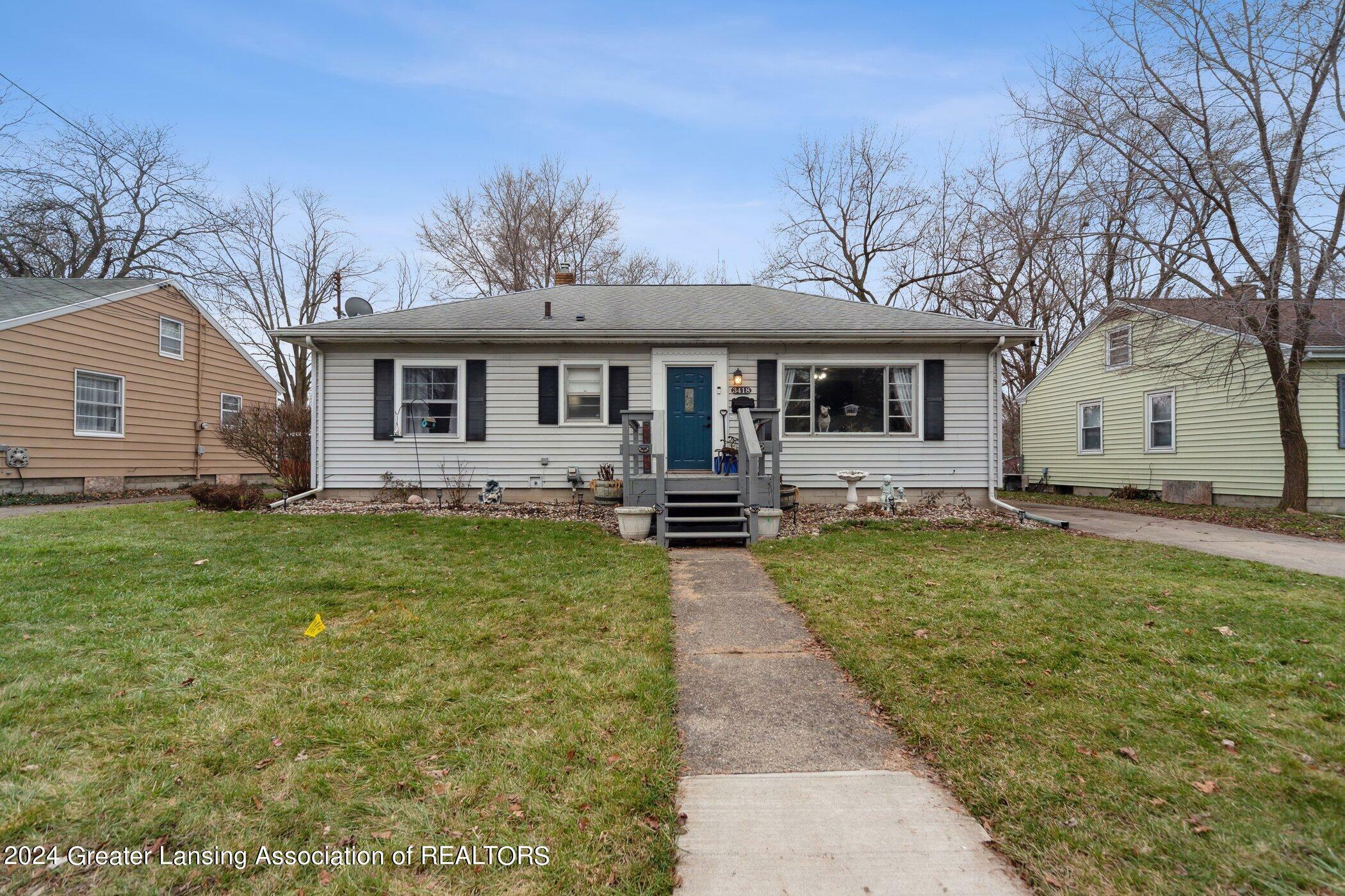 Property Photo:  3418 Schlee Street  MI 48910 