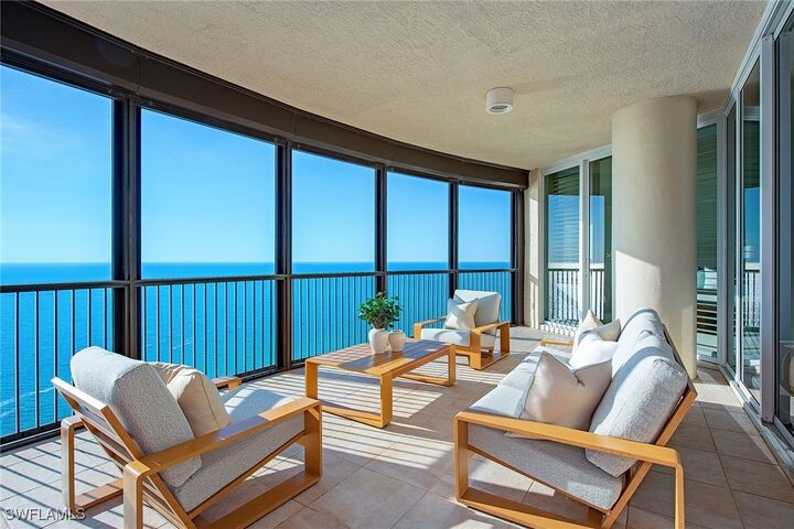 Property Photo:  8665 Bay Colony Drive 2002  FL 34108 