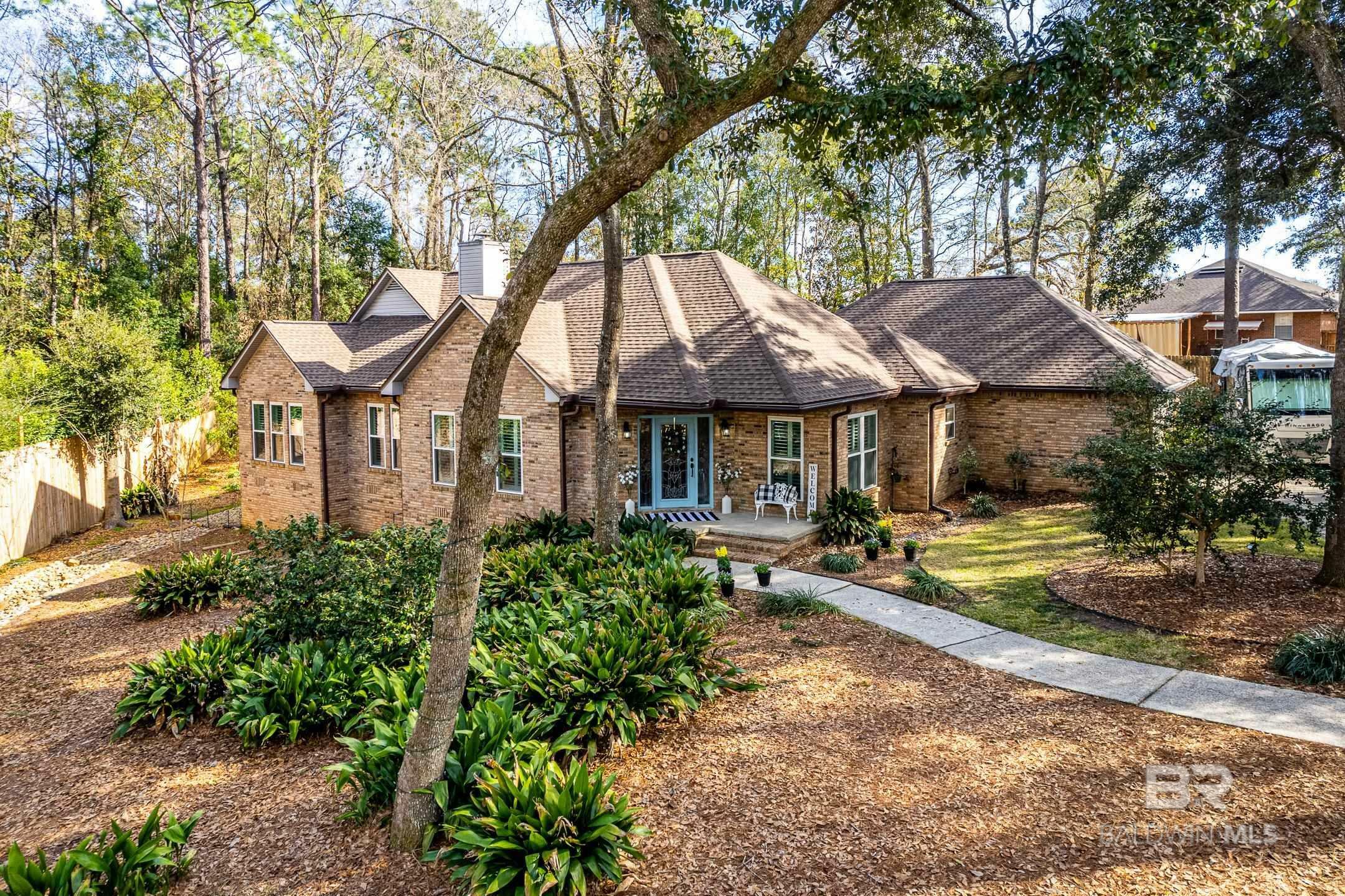 Property Photo:  21890 Country Woods Drive  AL 36532 