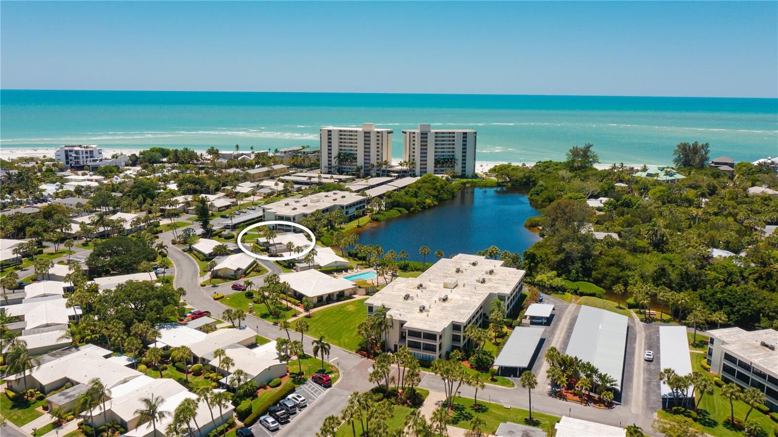 Property Photo:  105 Whispering Sands Drive V-48  FL 34242 