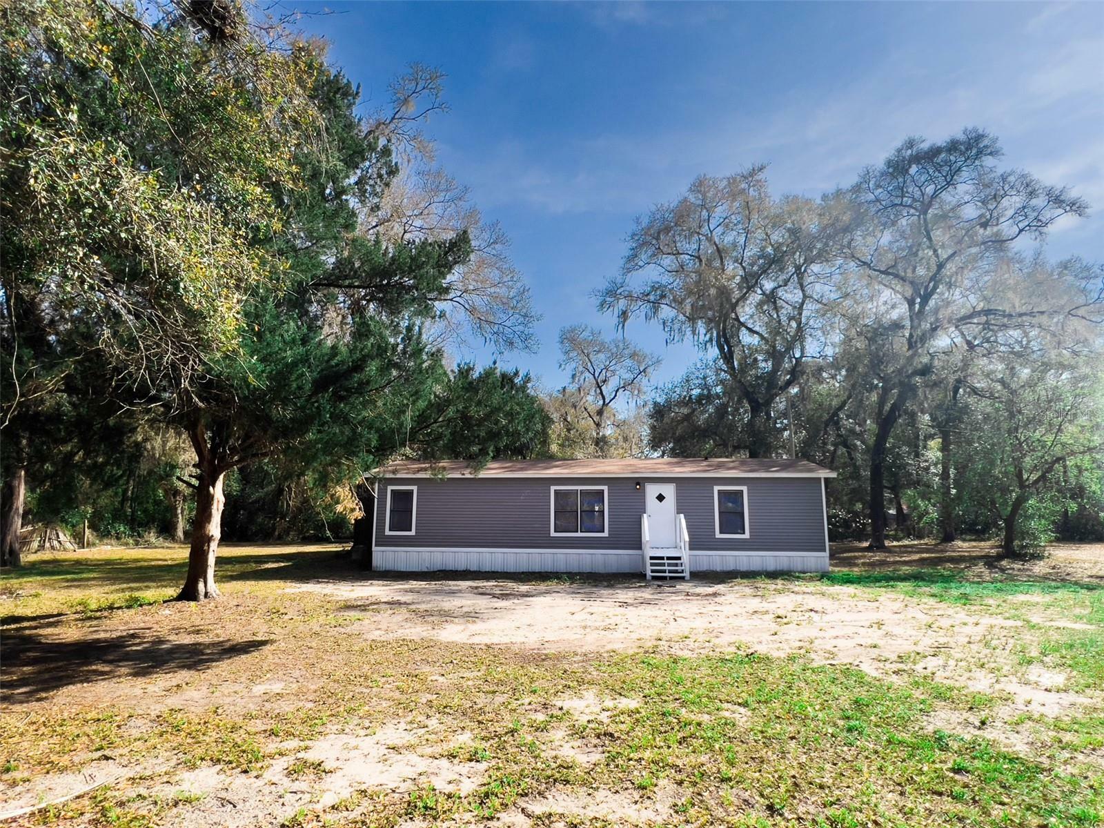 Property Photo:  15591 NE 150th Ter  FL 32134 