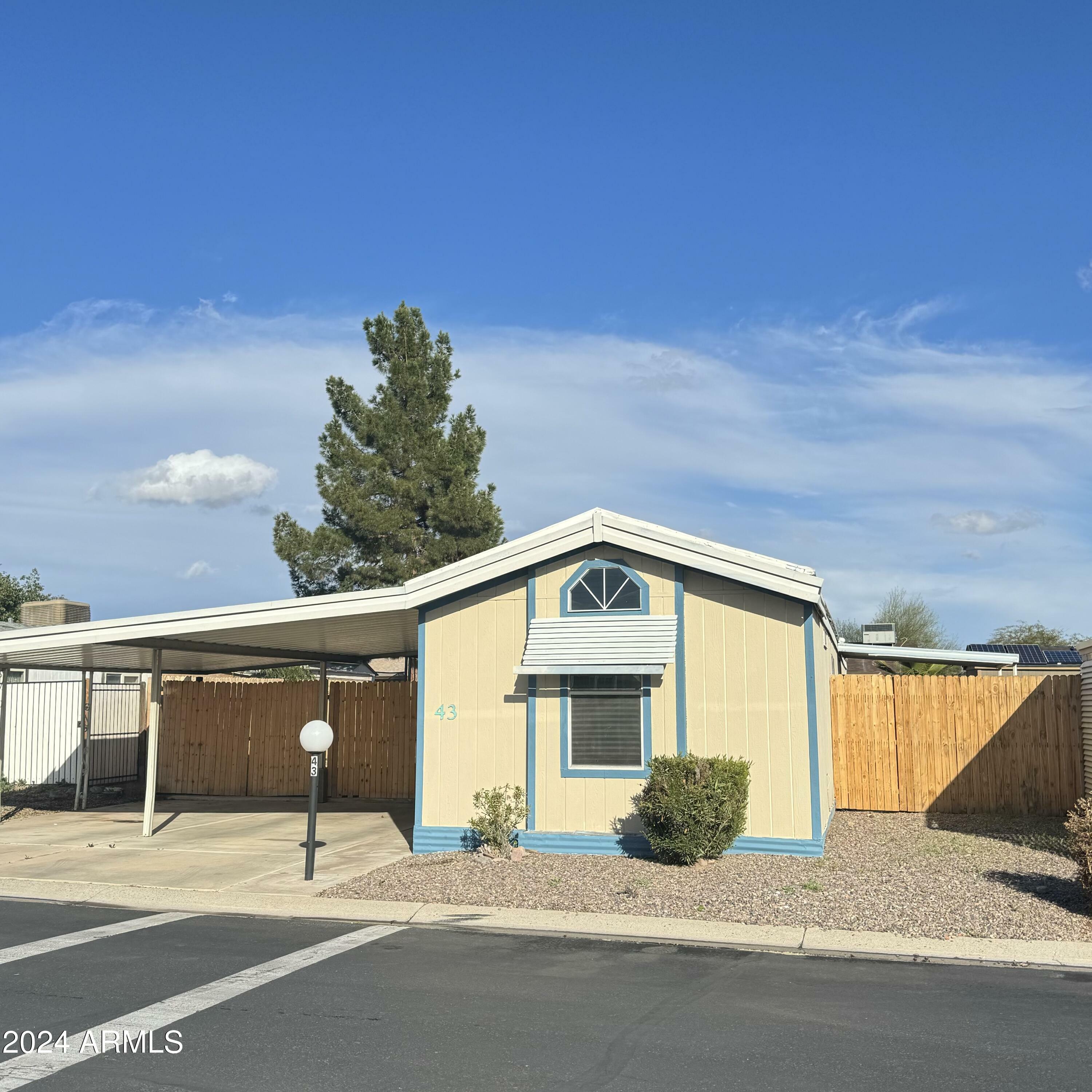 Property Photo:  10951 N 91st Avenue 43  AZ 85345 