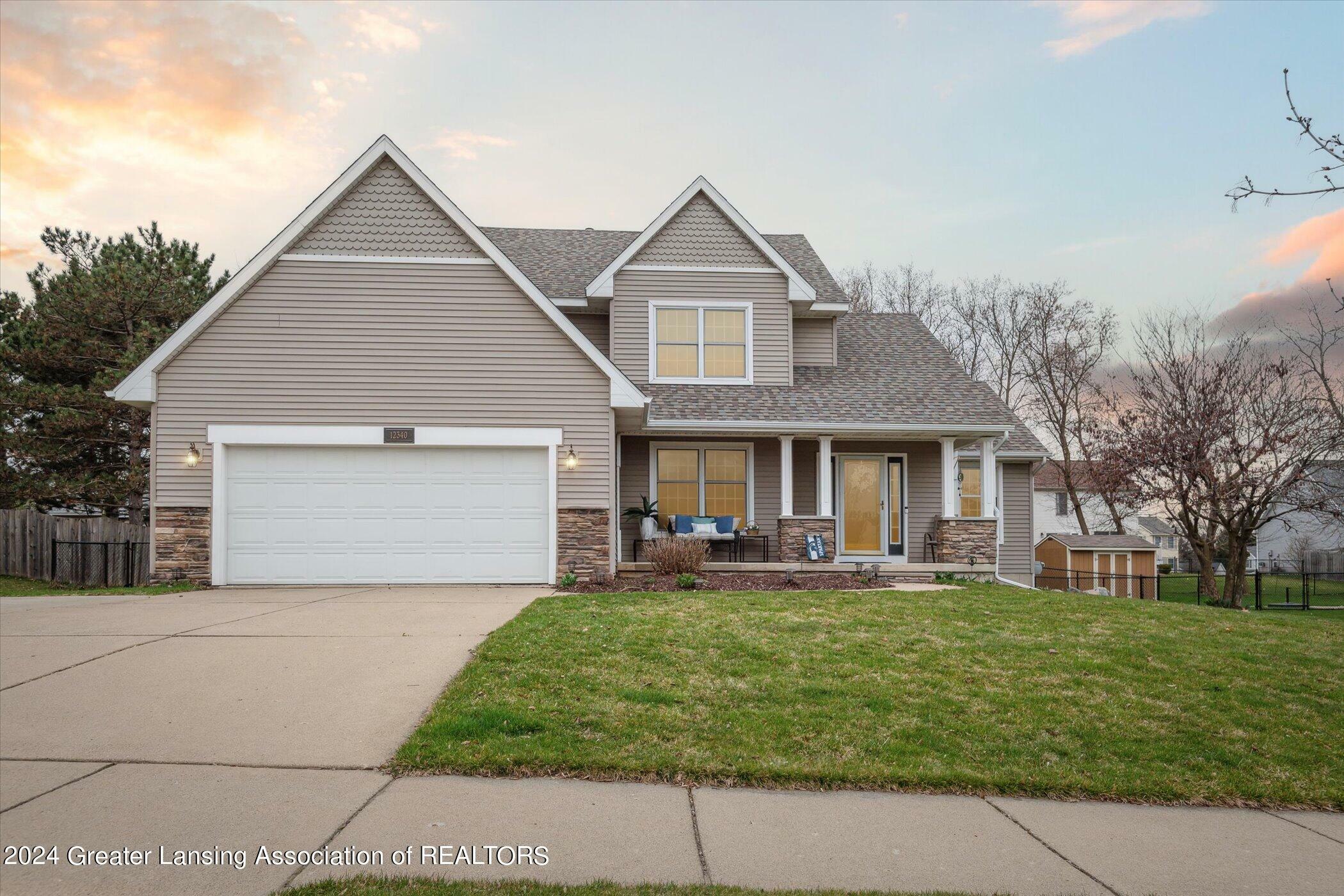 Property Photo: 12340 Oakland Hills Drive MI 48820