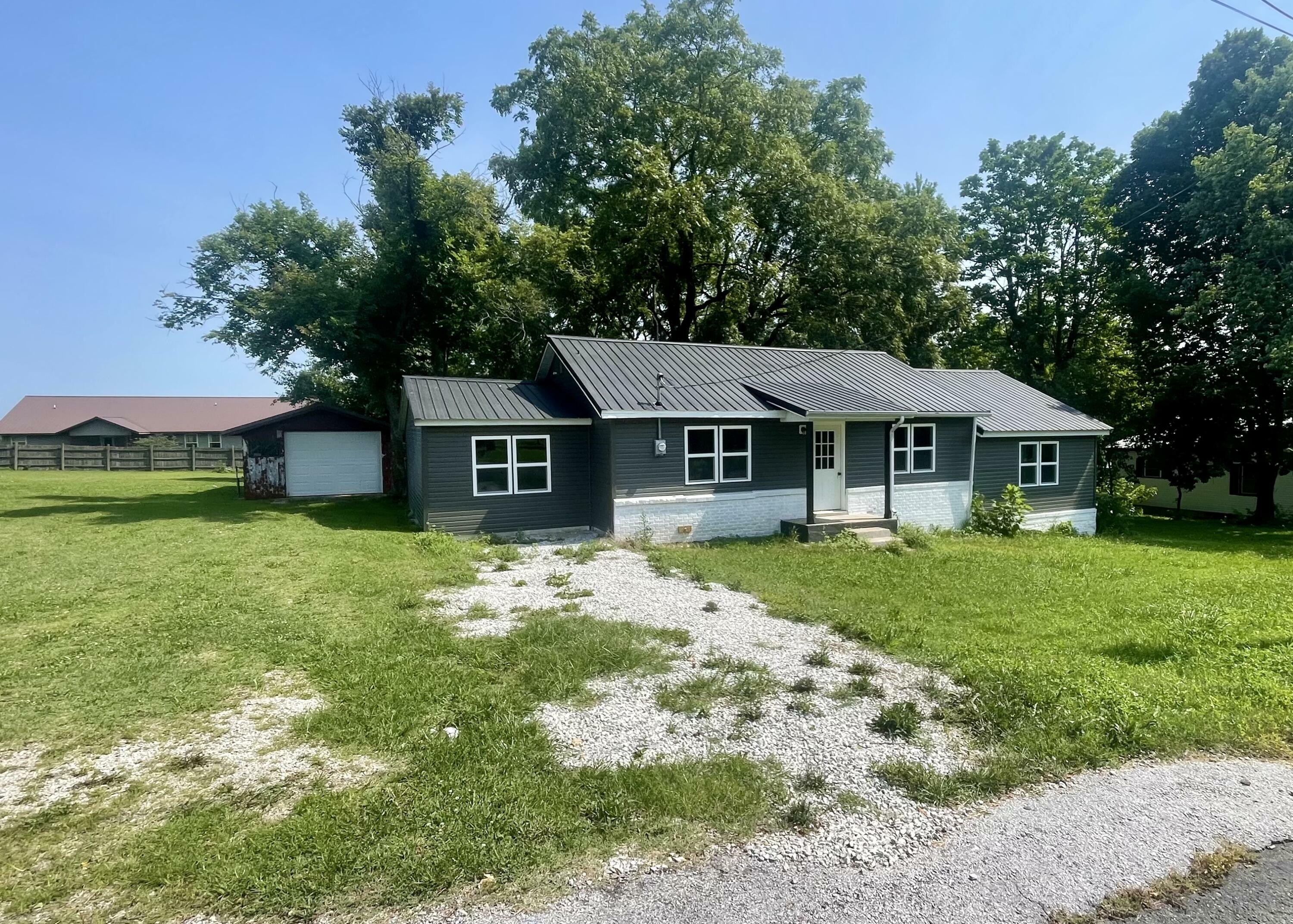 Property Photo: 411 W 13th Street MO 65711
