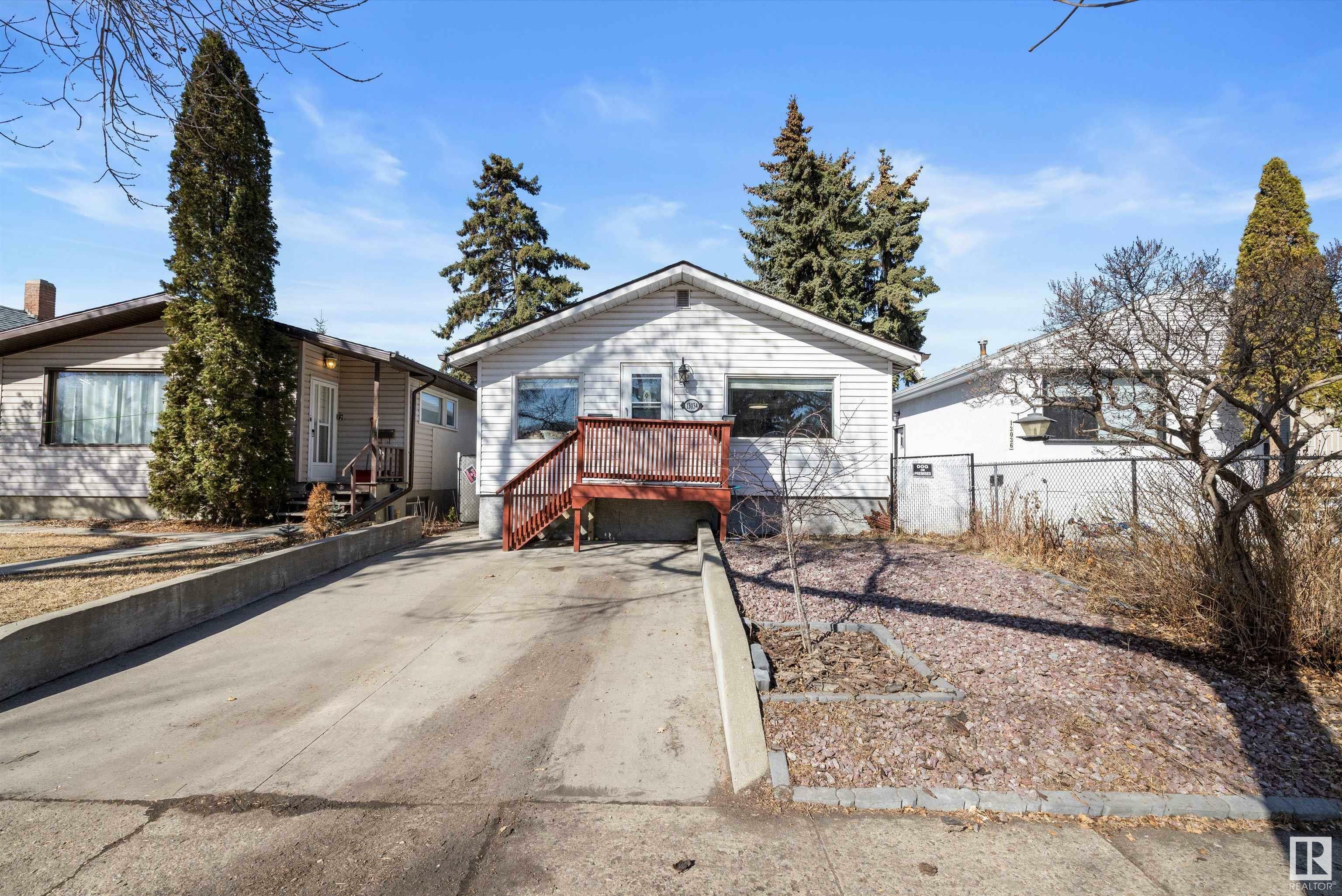 Property Photo:  13034 65 Street NW  AB T5A 1A1 