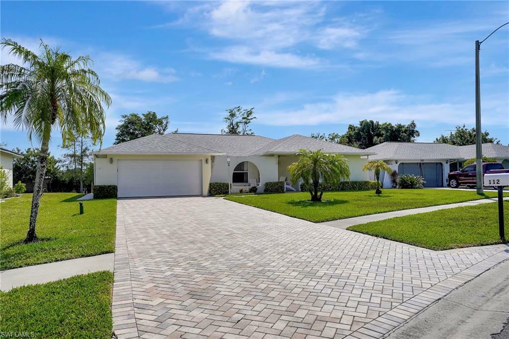 Property Photo:  112 Versailles Cir  FL 34112 