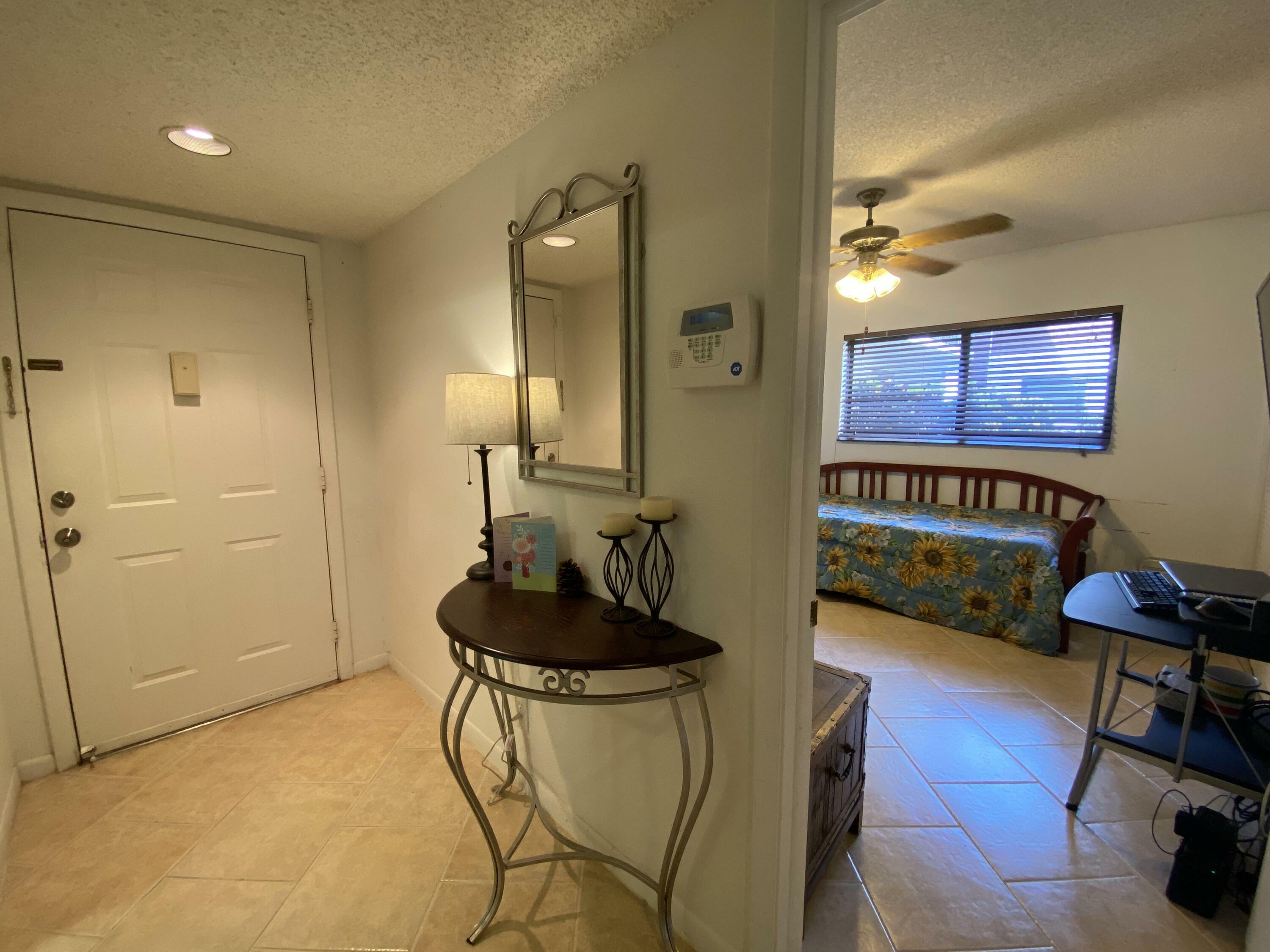 Property Photo:  15451 Pembridge Drive 217  FL 33484 