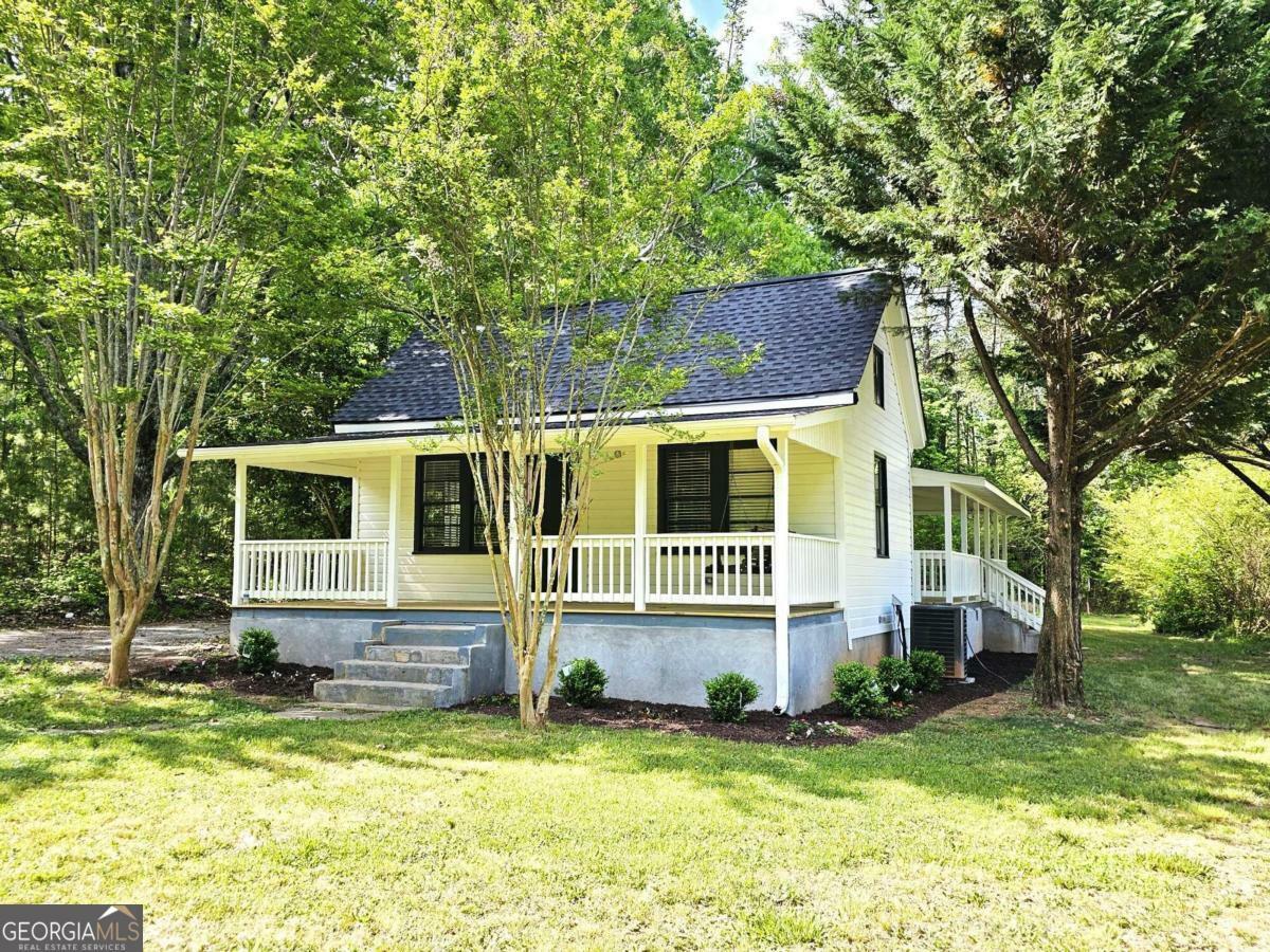 Property Photo:  2025 Mountain Road  GA 30040 