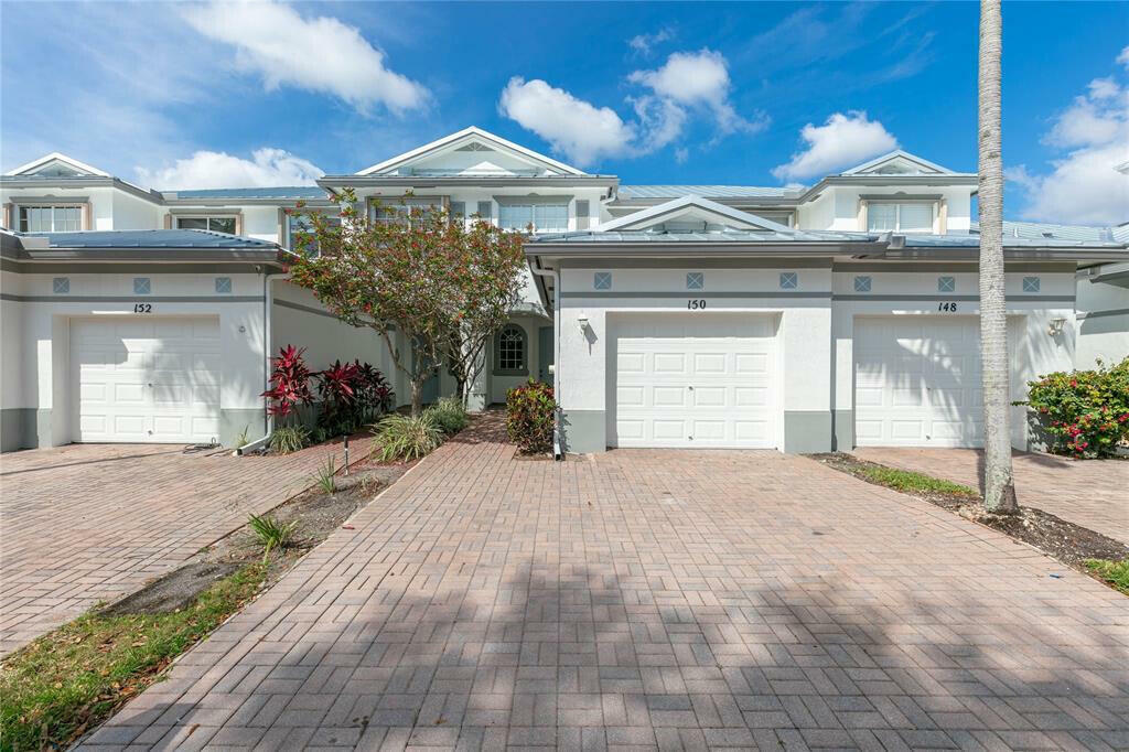 Property Photo:  150 Coconut Key Lane  FL 33484 