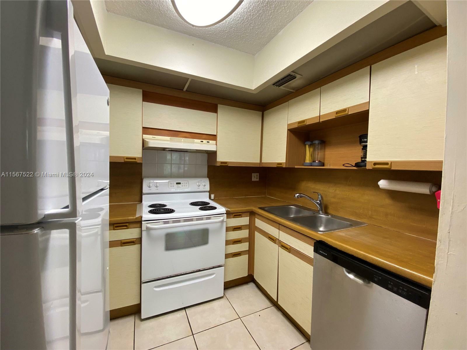 Property Photo:  8860 SW 123rd Ct K207  FL 33186 