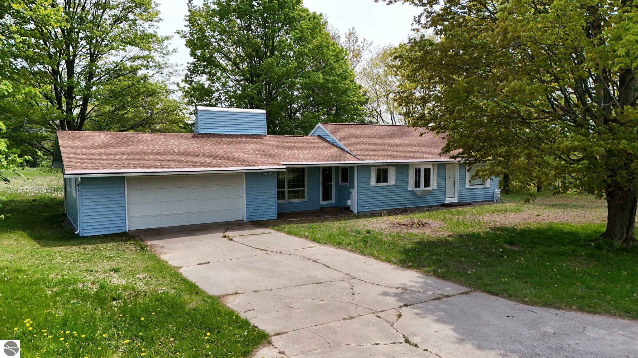 Property Photo:  6691 N Long Lake Road  MI 49685 