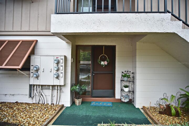 Property Photo:  170 Palmetto Woods Court 1C  FL 32725 
