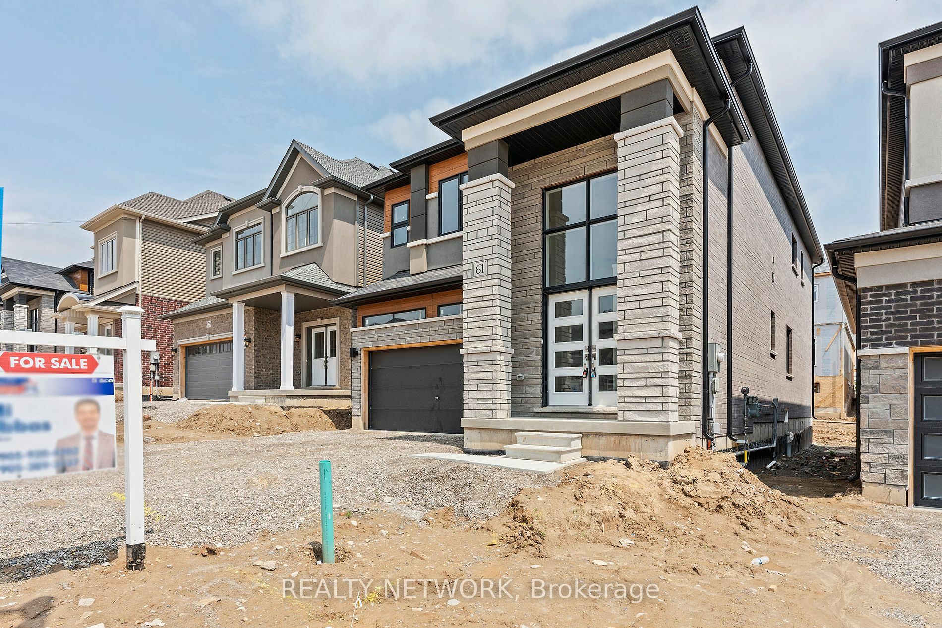 Property Photo:  61 George Brier Dr E  ON N3L 4A2 