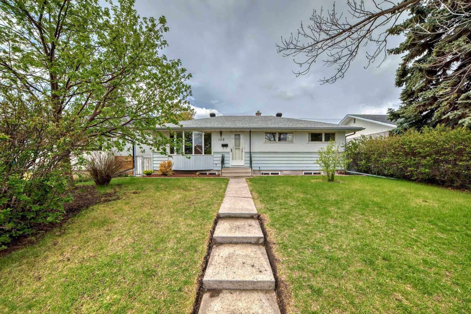Property Photo: 128 Glenpatrick Drive SW AB T3E 4L6