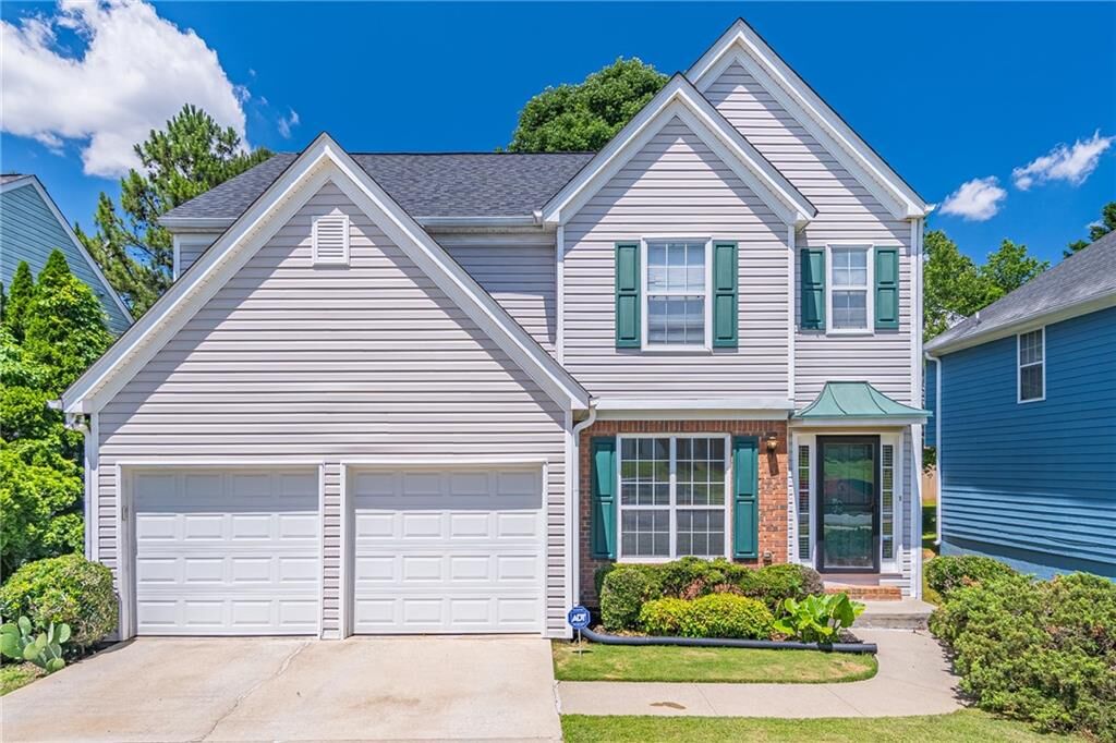 Property Photo:  6945 Magnolia Park Lane  GA 30093 