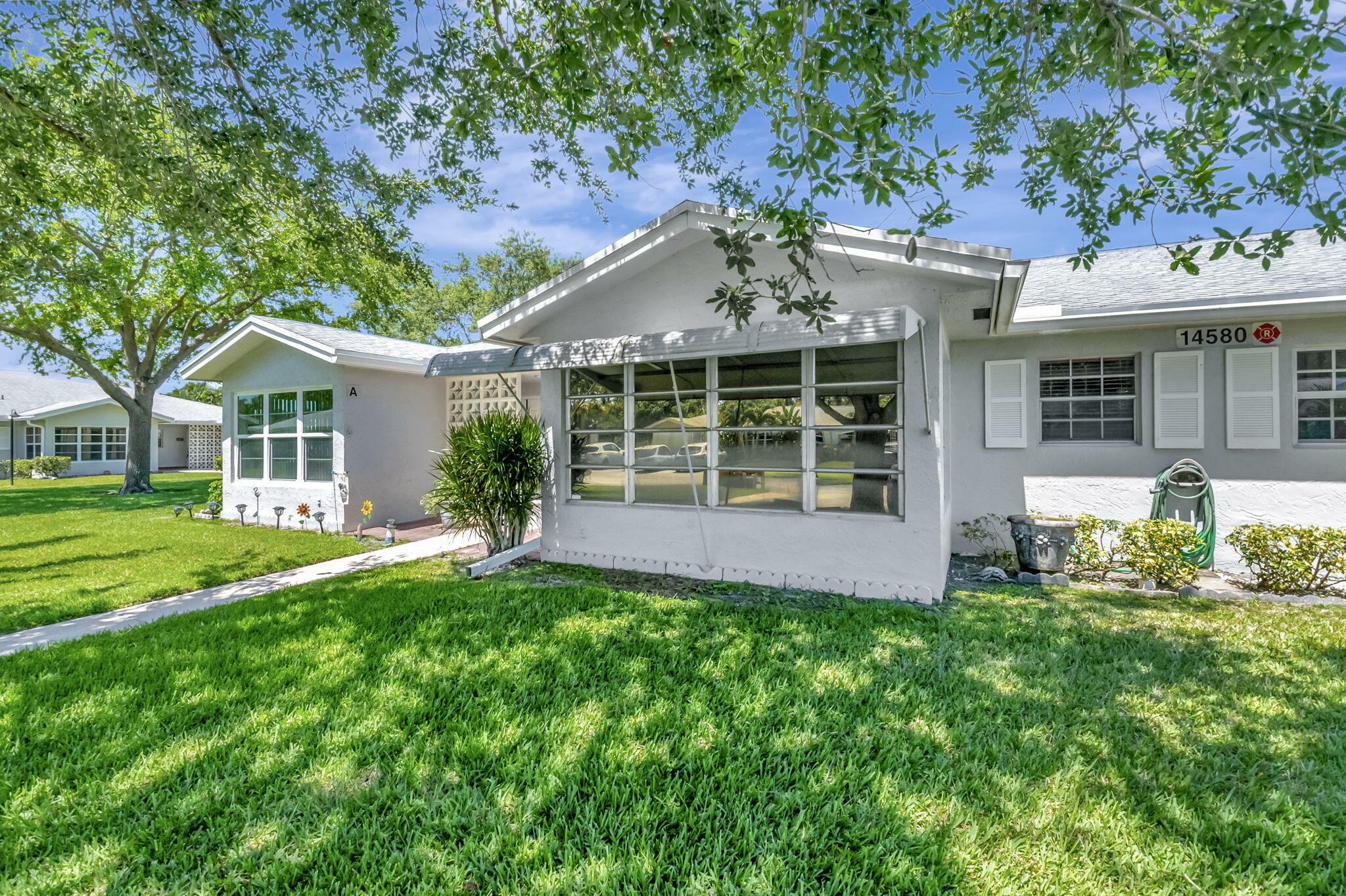 Property Photo:  14580 Canalview Drive B  FL 33484 