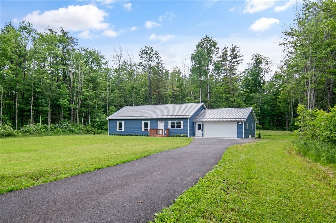 Property Photo:  310 Wood Road  NY 13068 