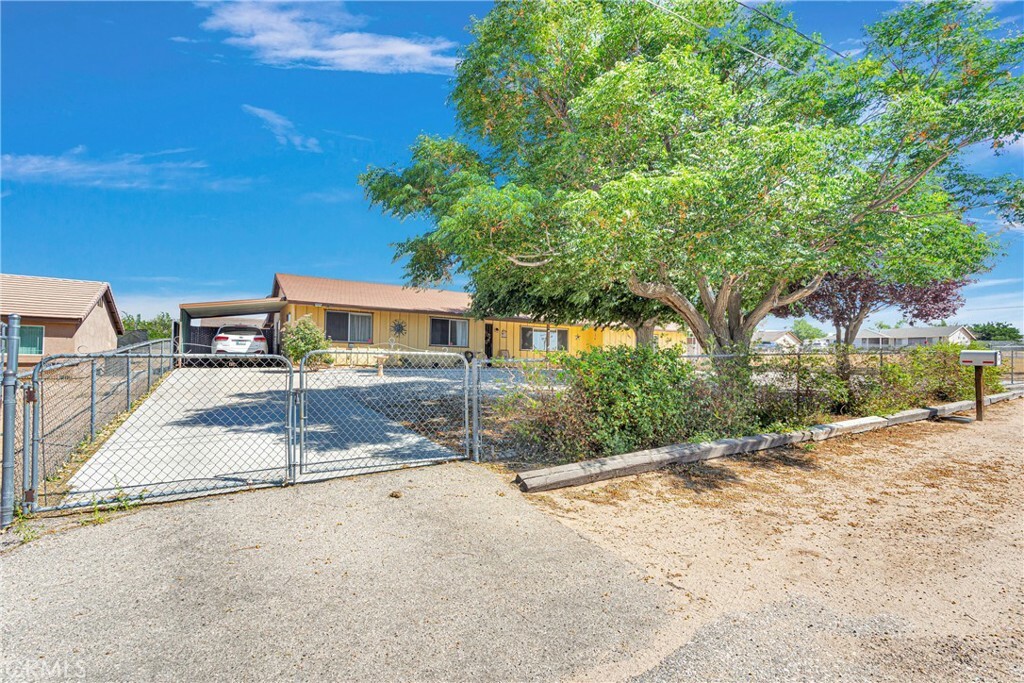 Property Photo:  9445 Grapefruit Avenue  CA 92345 