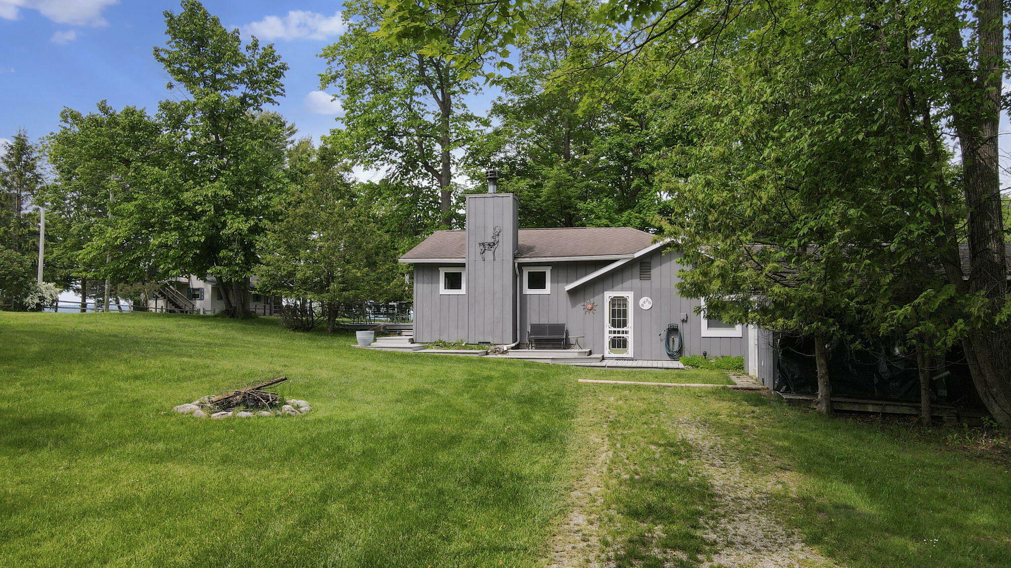 Property Photo:  6450 Margaret Lane  MI 49749 