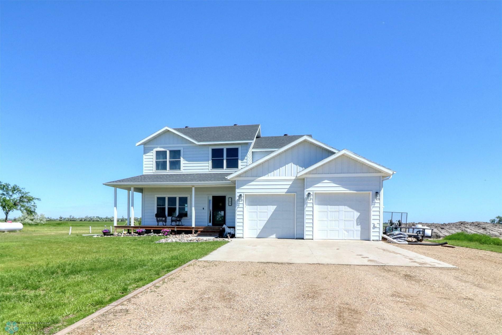 Property Photo:  107 Neuman Boulevard N  ND 58018 