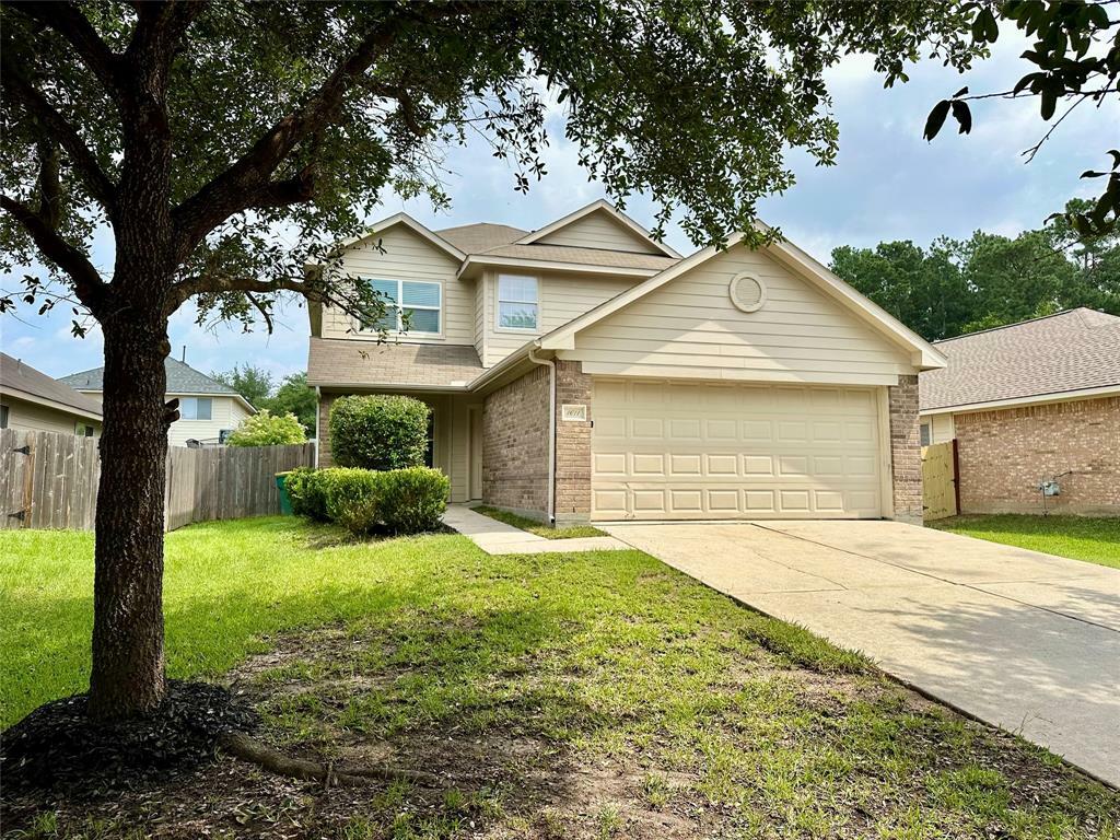 Property Photo:  1611 Redbud Grove Court  TX 77301 