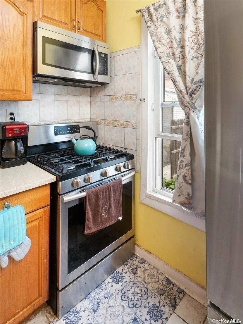 Property Photo:  104-81 127th Street  NY 11419 