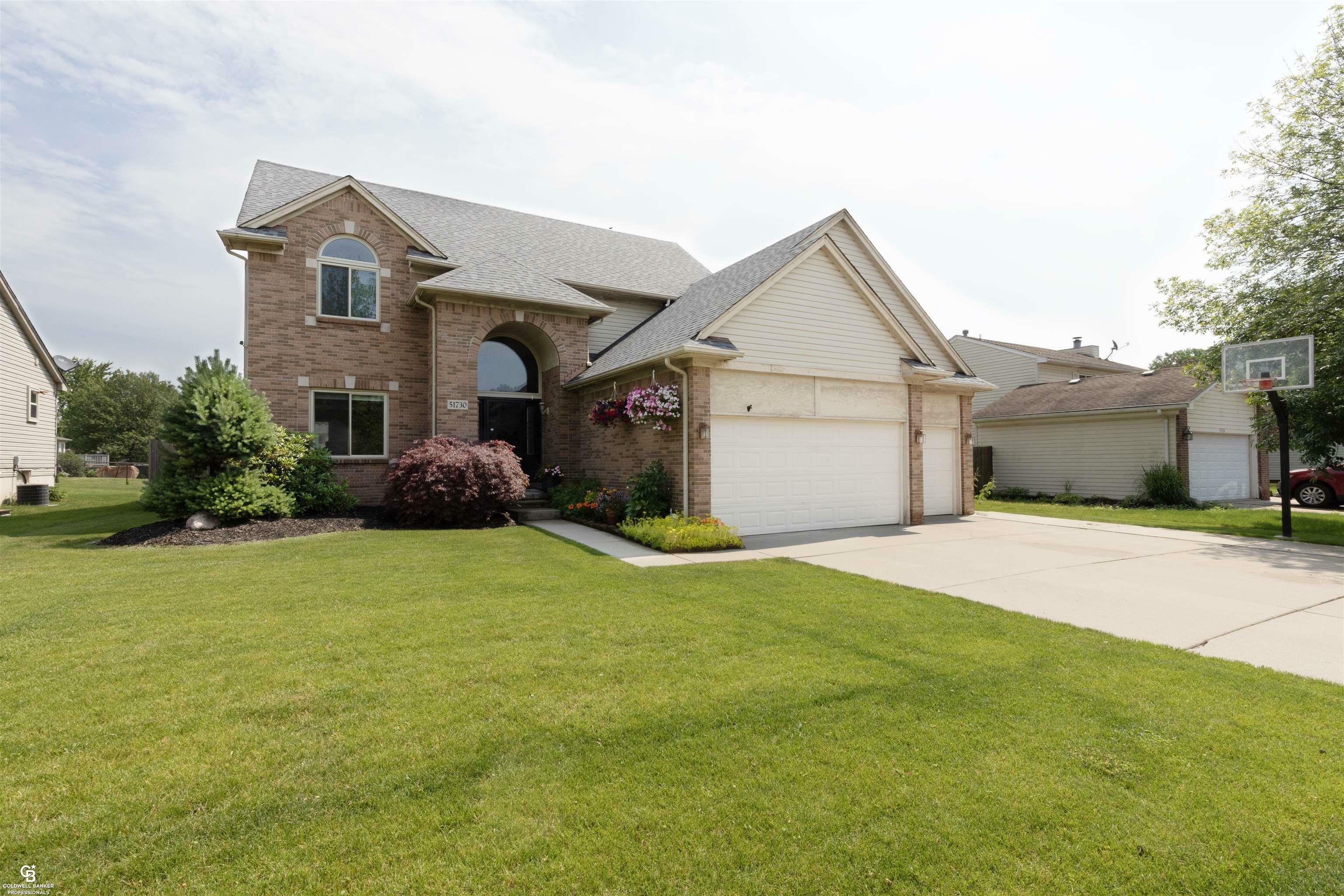 Property Photo:  51730 Kings Pointe  MI 48047 