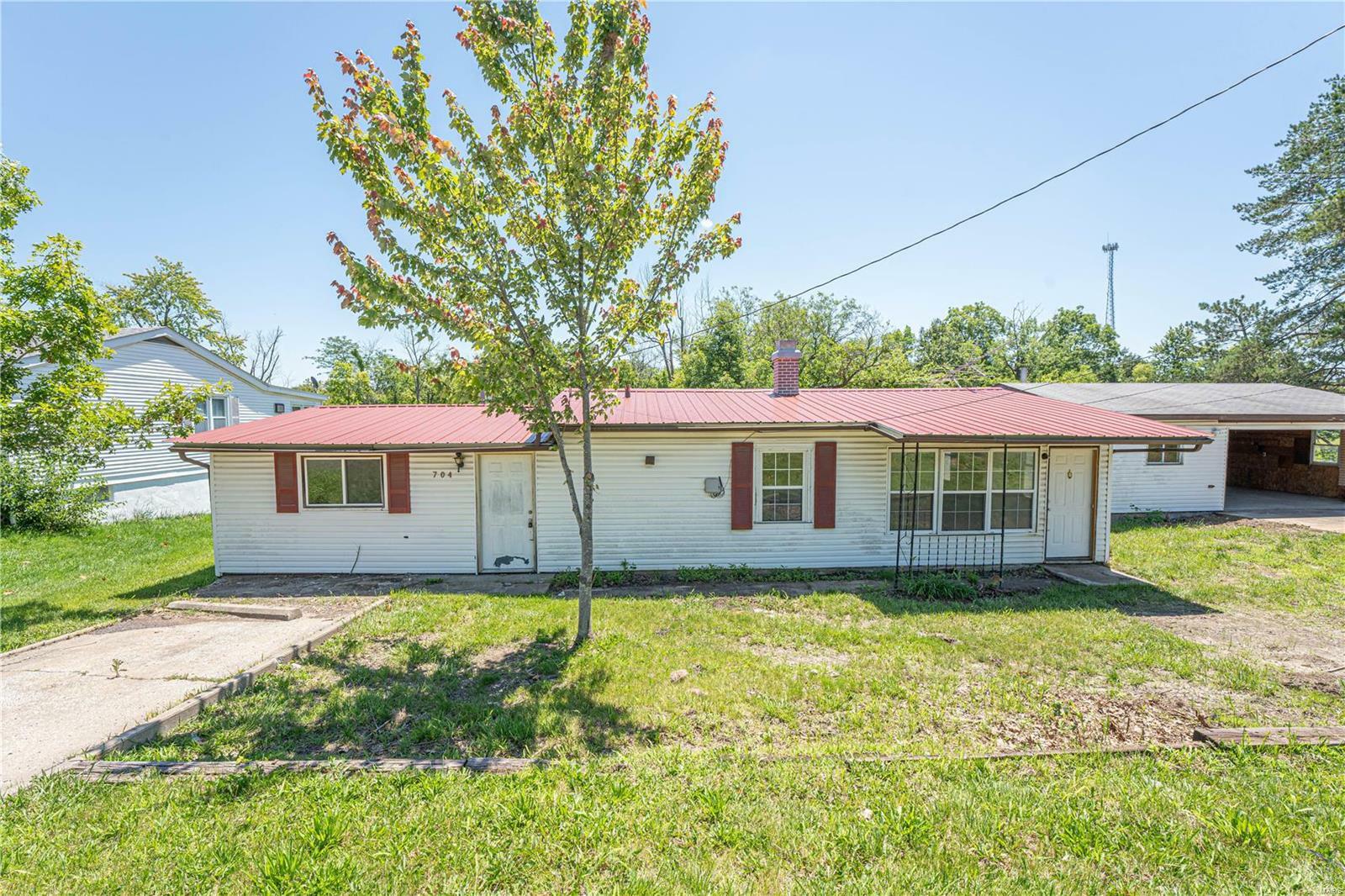 Property Photo:  704 Churchill Road  MO 65251 