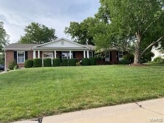 Property Photo: 9809 Roundhill Drive MO 63128