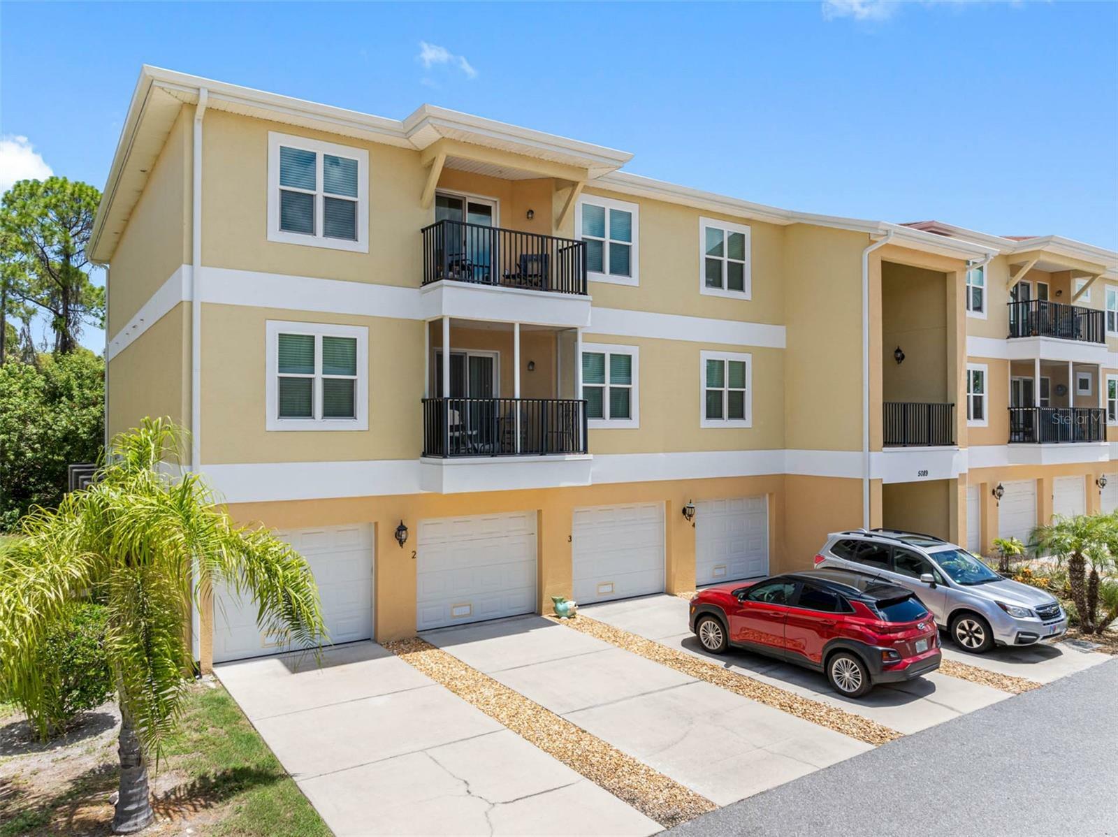 Property Photo:  5089 Royal Palms Way 202  FL 34652 