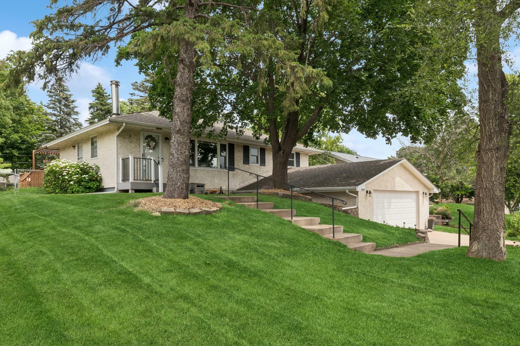 Property Photo:  6640 4th Street N  MN 55128 