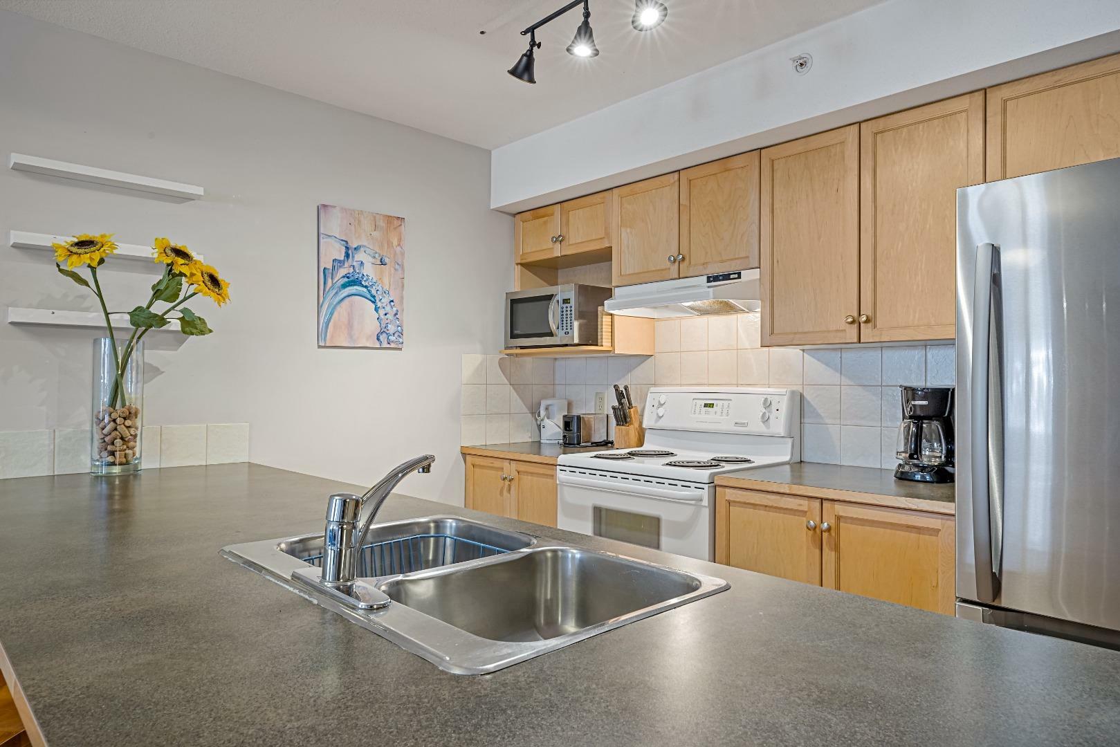 Property Photo:  743 Railway Avenue 307  AB T1W 1P2 