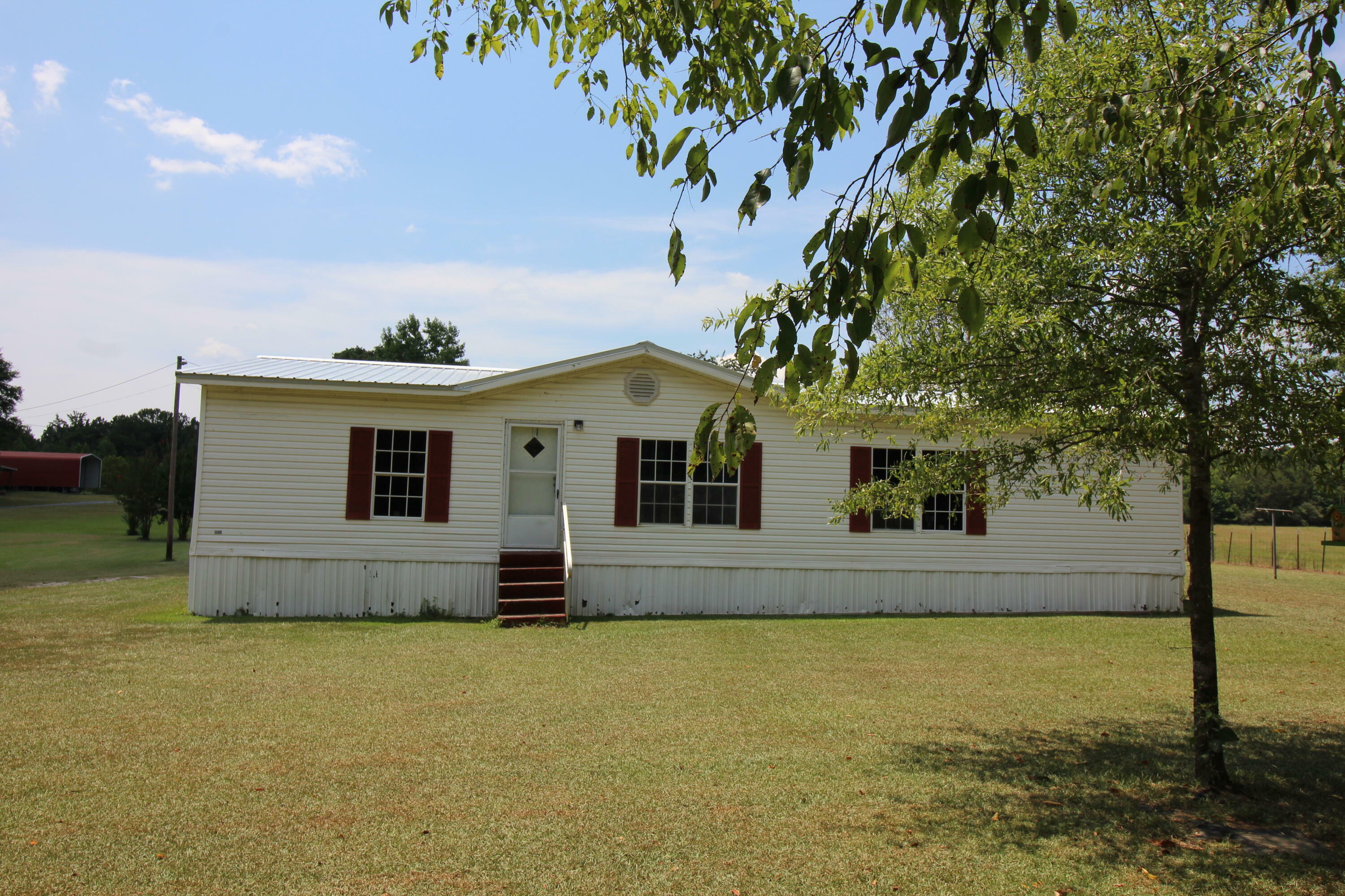 Property Photo:  869 Highway 145  MS 38824 