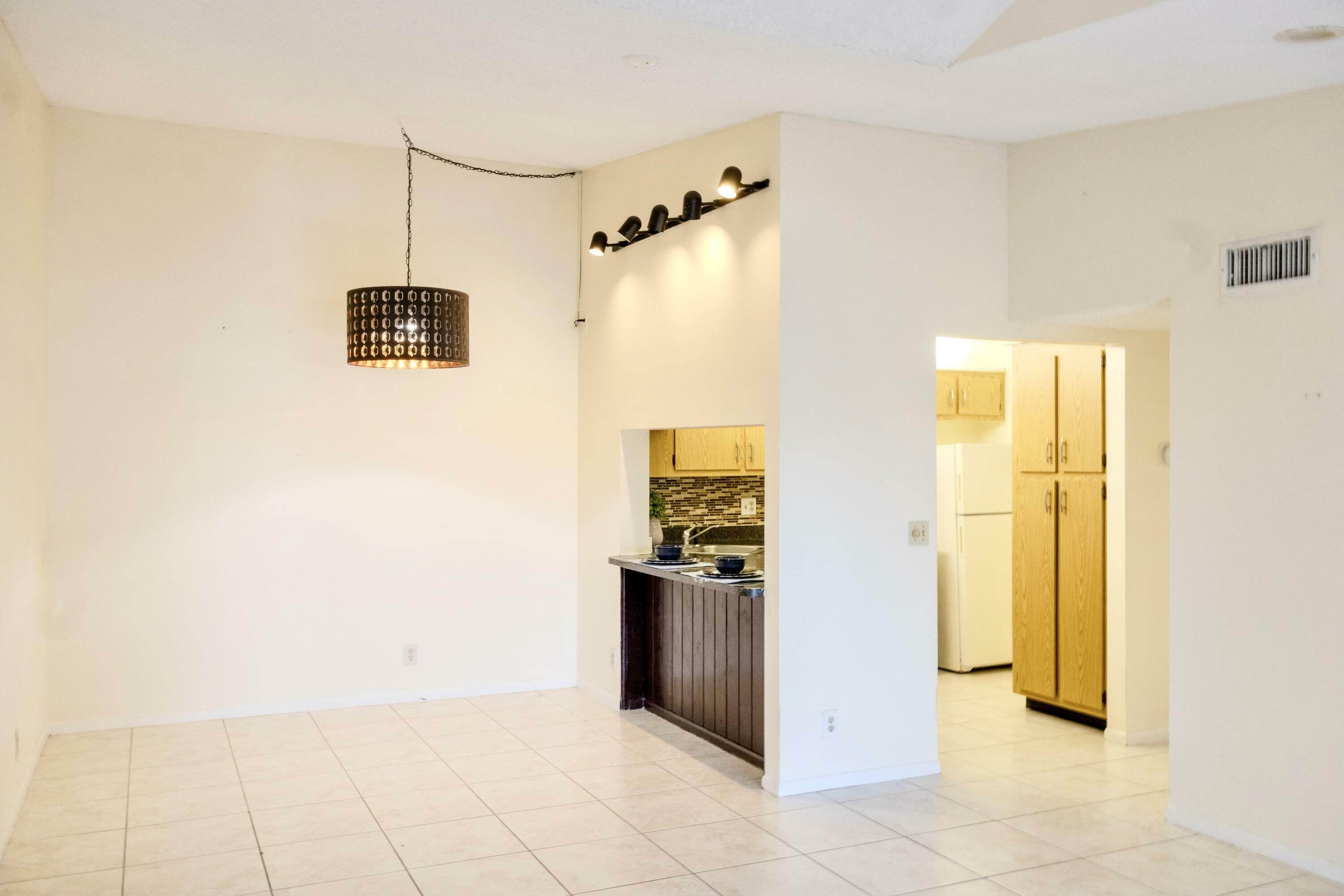 Property Photo:  209 Foxtail Drive H3  FL 33415 