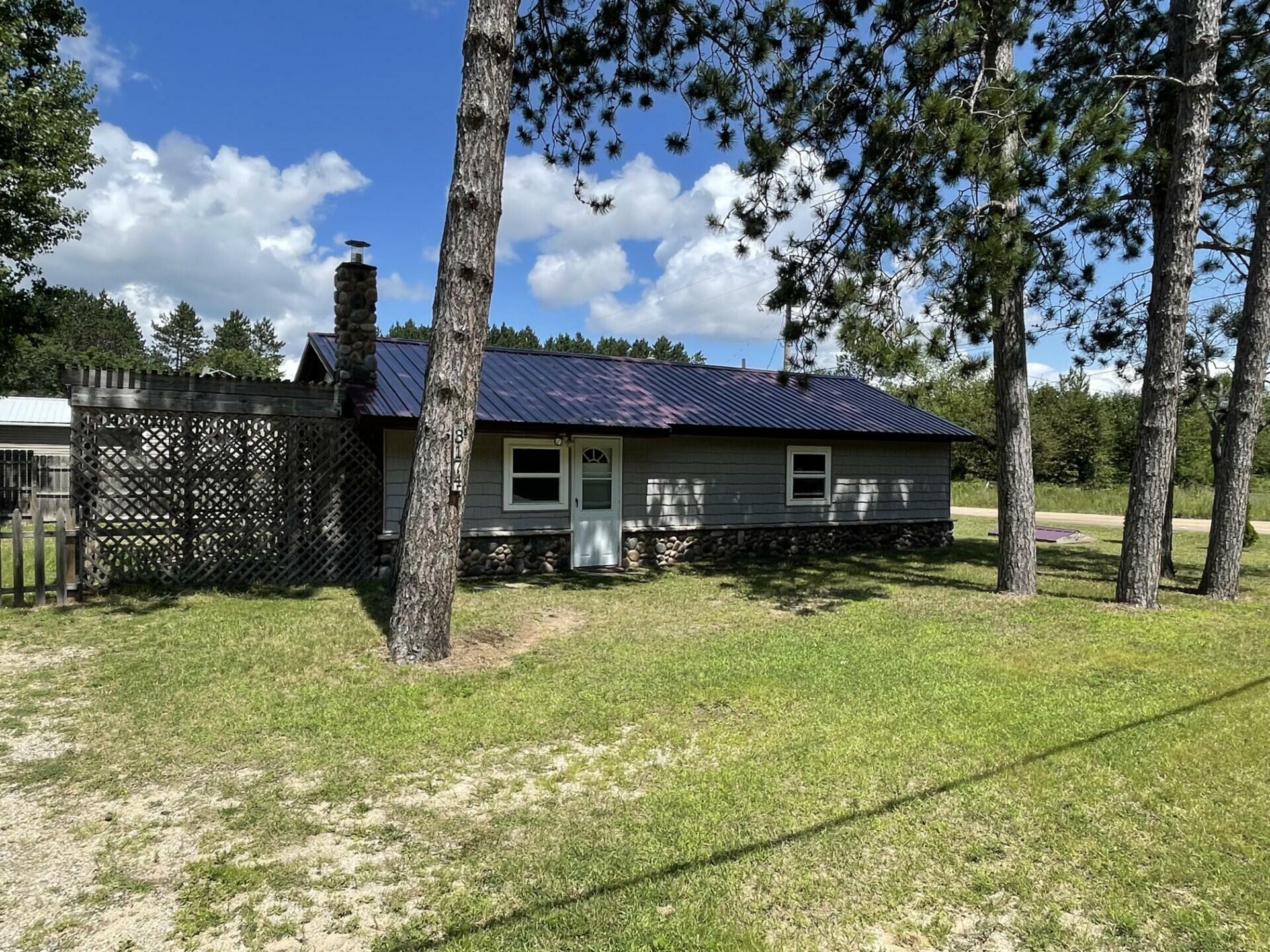 Property Photo:  3174 Old Alba Road  MI 49735 