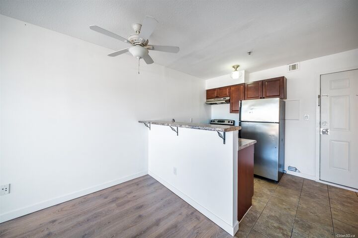 Property Photo: 5520 Joyce Street 304 BC V5R 4H6