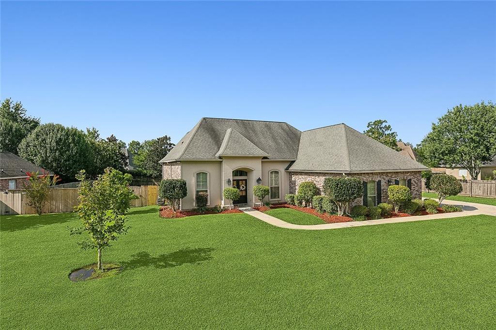 Property Photo:  129 Normandy Oaks Boulevard  LA 70433 