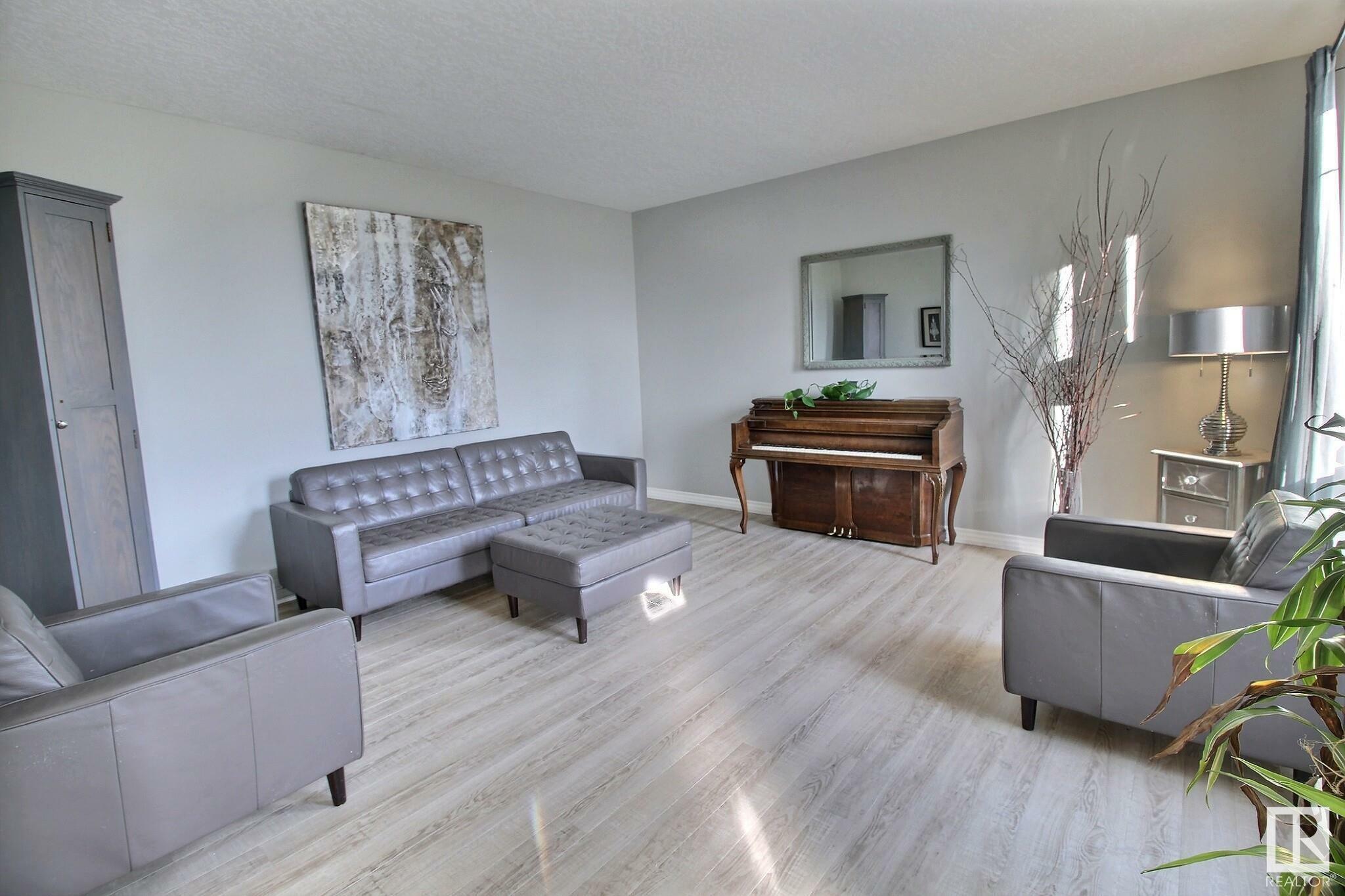 Property Photo:  7210 2 Street SW  AB T6X 2P8 