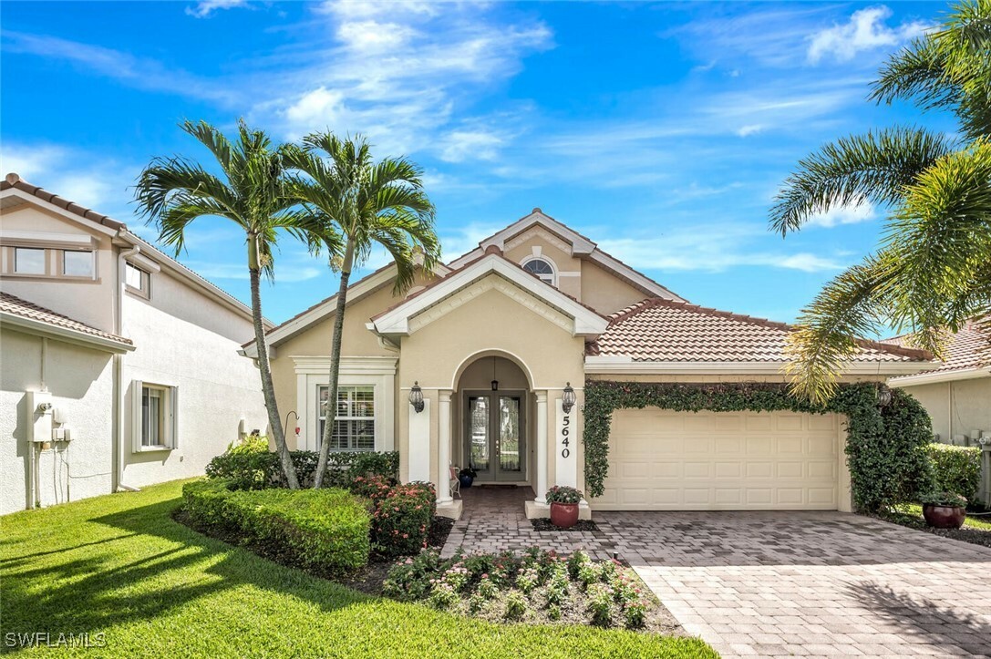 Property Photo:  5640 Lago Villaggio Way  FL 34104 