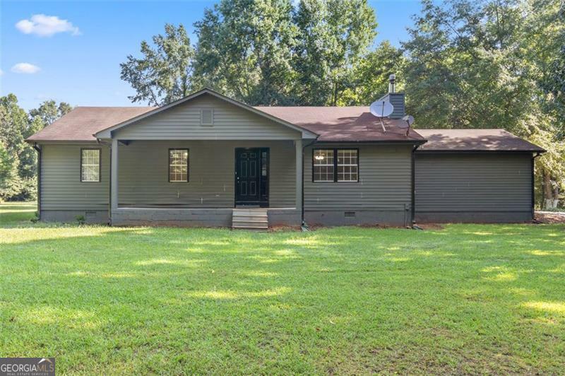 Property Photo:  1546 Bucksnort Road  GA 30233 