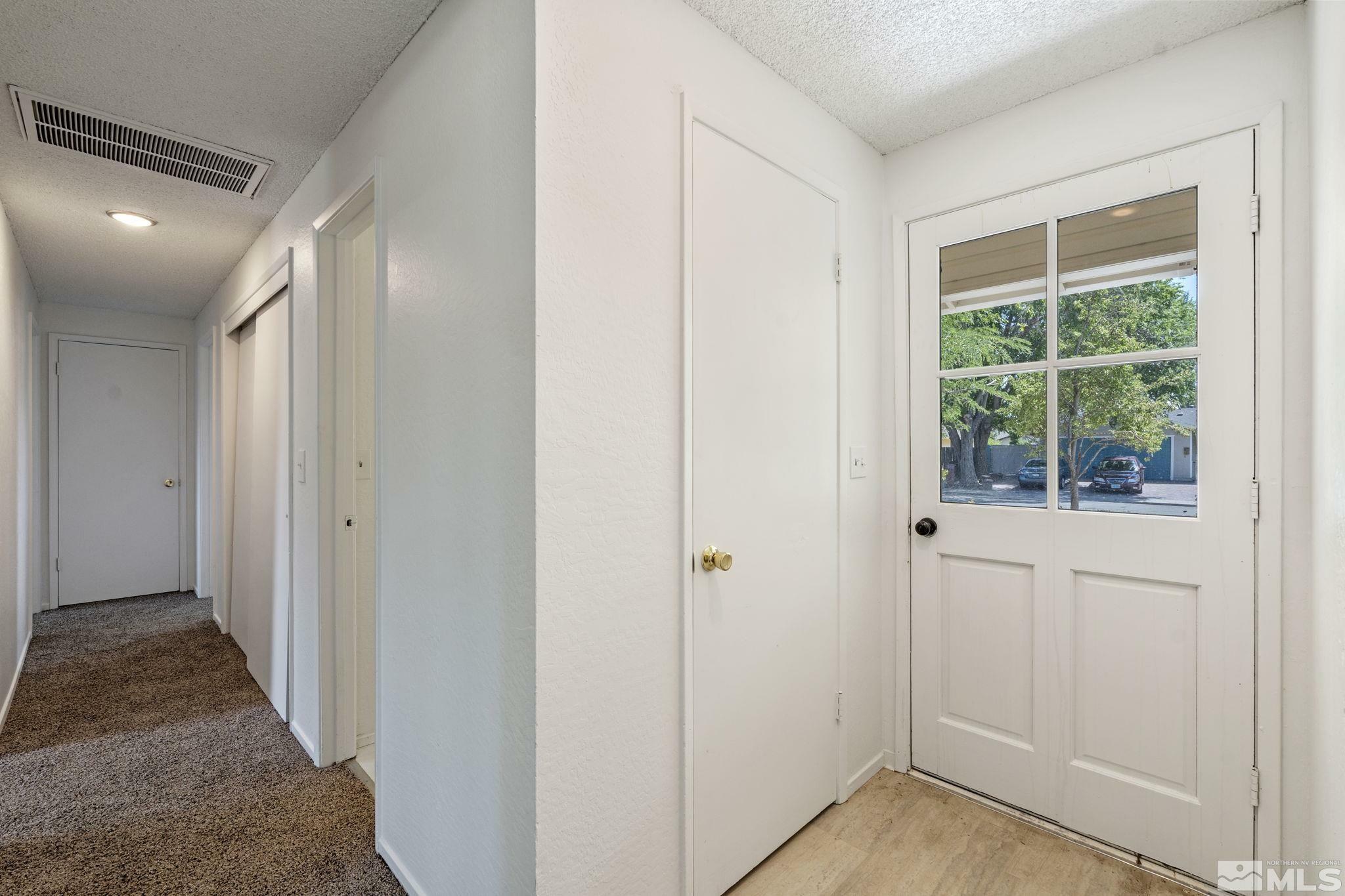 Property Photo:  406 Rawhide Way  NV 89701 