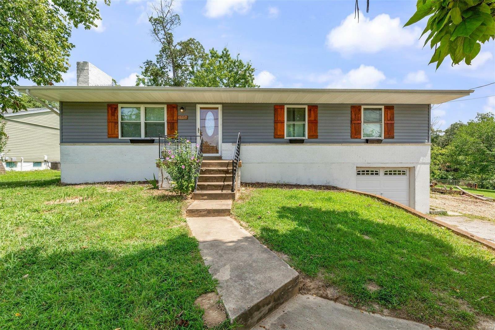 Property Photo:  6558 Deerwood Drive  MO 63016 