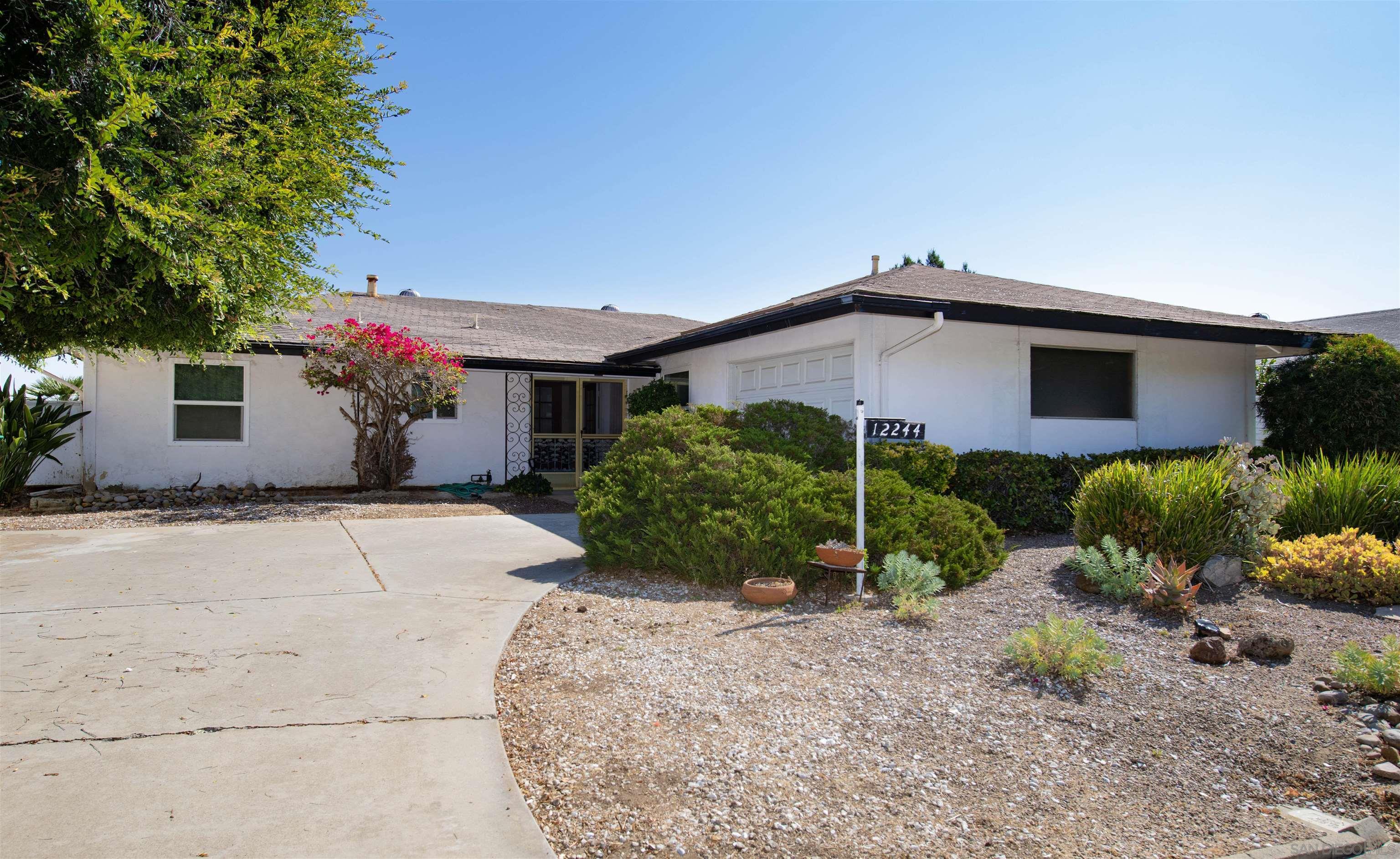 Property Photo: 12244 Lomica Dr CA 92128