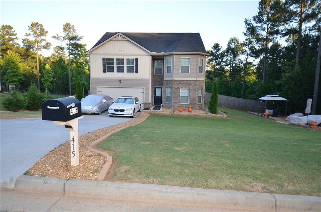 Property Photo:  415 White Pine Drive  GA 30233 