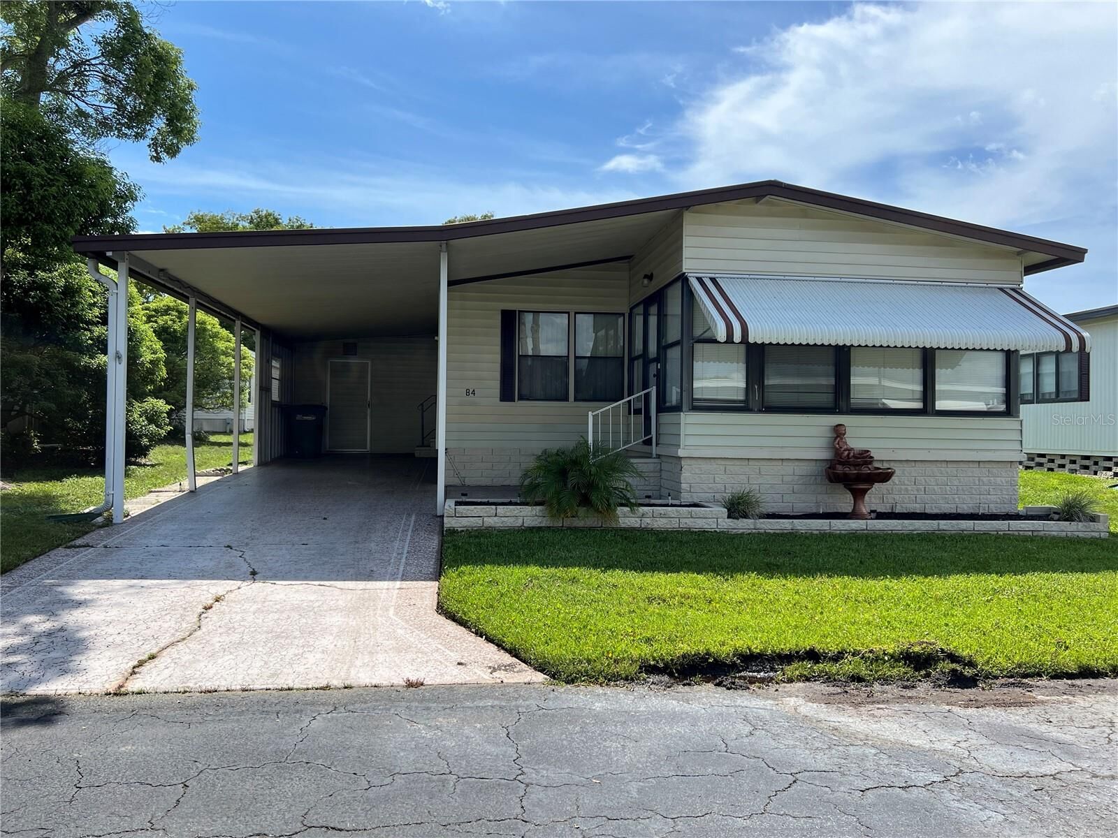 Property Photo:  84 Red Fox Run 7  FL 34695 