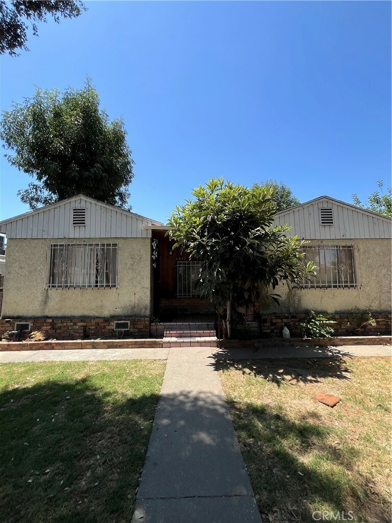 Property Photo:  6843 Delta  CA 90805 