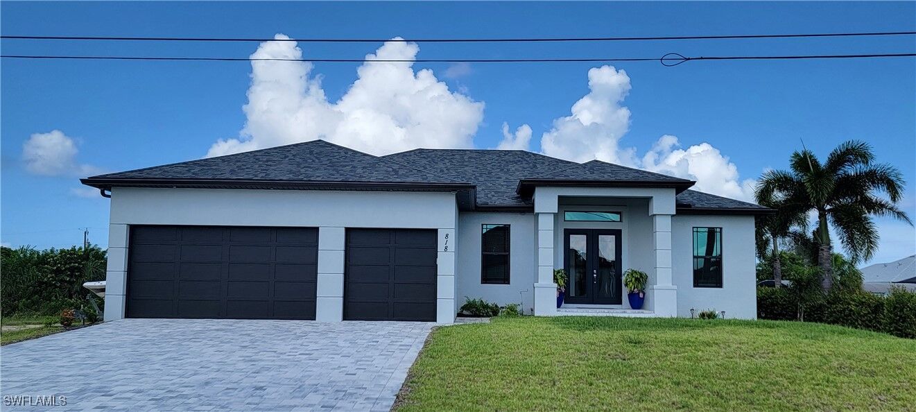 Property Photo:  818 NW 36th Avenue  FL 33993 